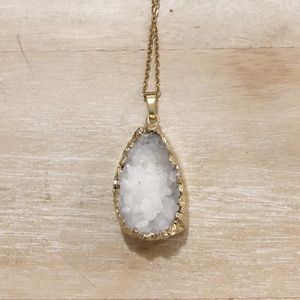 Gold and white necklace
